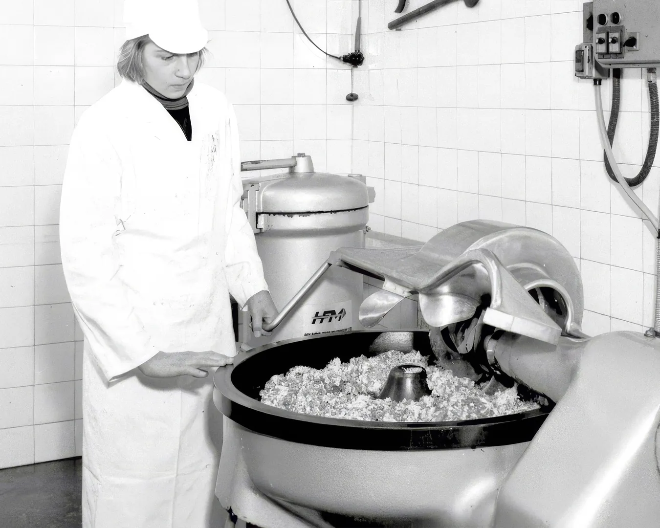 Historic sausage production in a butcher's kitchen