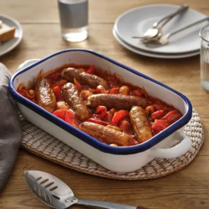 Pork and beef sausage casserole in a baking dish